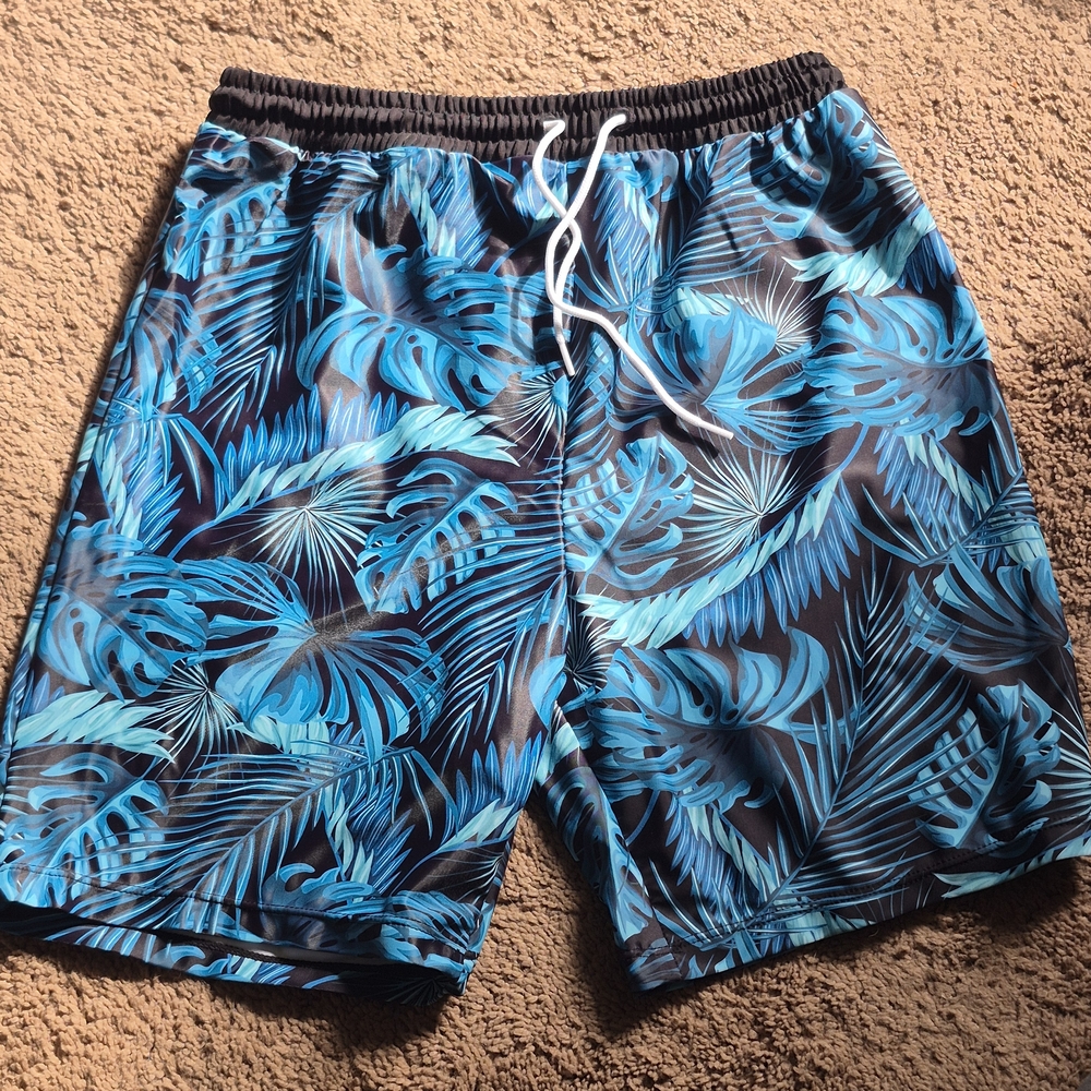 SHEIN Tropical Blue Leaf Kids Swim Trunks